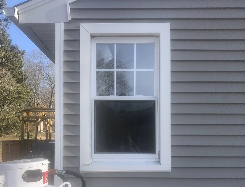Old poor quality vinyl windows